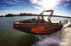 Image of a premium pontoon gliding across the water