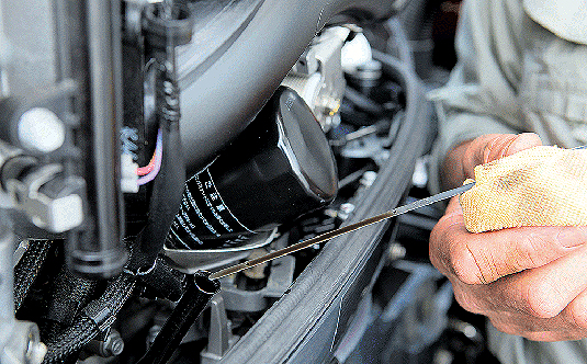 Service being completed on a engine.